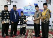 lebaran-yatim-dan-penyandang-disabilitas-di-padang-hadirkan-140-peserta,-wawako-serahkan-bantuan